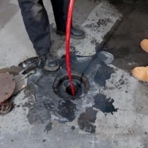 Beeco's Plumbing technician performing professional drain cleaning in Feasterville PA
