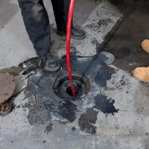 Beeco's Plumbing technician performing professional drain cleaning in Feasterville PA
